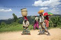 Rwandese People Walking on Gravel Road