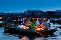 Lever du jour sur le marché flottant nocturne de la cité lacustre de Ganvié, sur le Lac Nokoué, tout près de Cotonou la plus grande ville du Bénin.  Ganvié est le plus grand village lacustre d'Afrique. Africa 
 Afrique 
 Benin 
 Bénin 
 Cotonou 
 Ganvié 
 Lake 
 Nokoué 
 city 
 cité 
 eau 
 femmes 
 fishermen 
 flottant 
 lac 
 lacustre 
 lagune 
 marché 
 pirogue 
 pêcheurs 