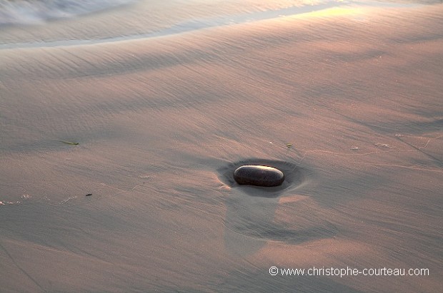 Pebble on Beach at Sunset in the Bay of Audierne, Brittany, France