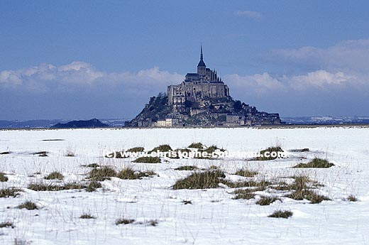 The Mont Saint Michel covered by the snow.